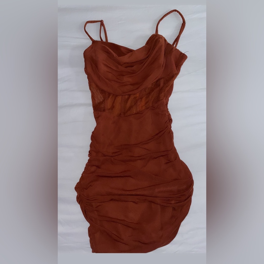 Short brown dress with a see through part on the stomach size s